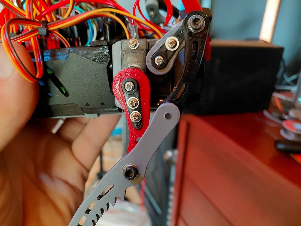 A hand-held view of the printed leg carrier, linkage and lower leg.